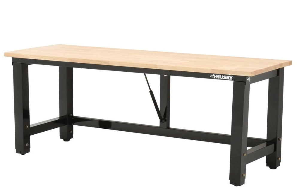 Husky 6-ft. folding adjustable height solid wood top workbench for $209