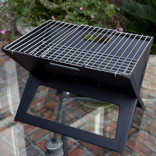 Fire Sense Notebook charcoal grill for $28
