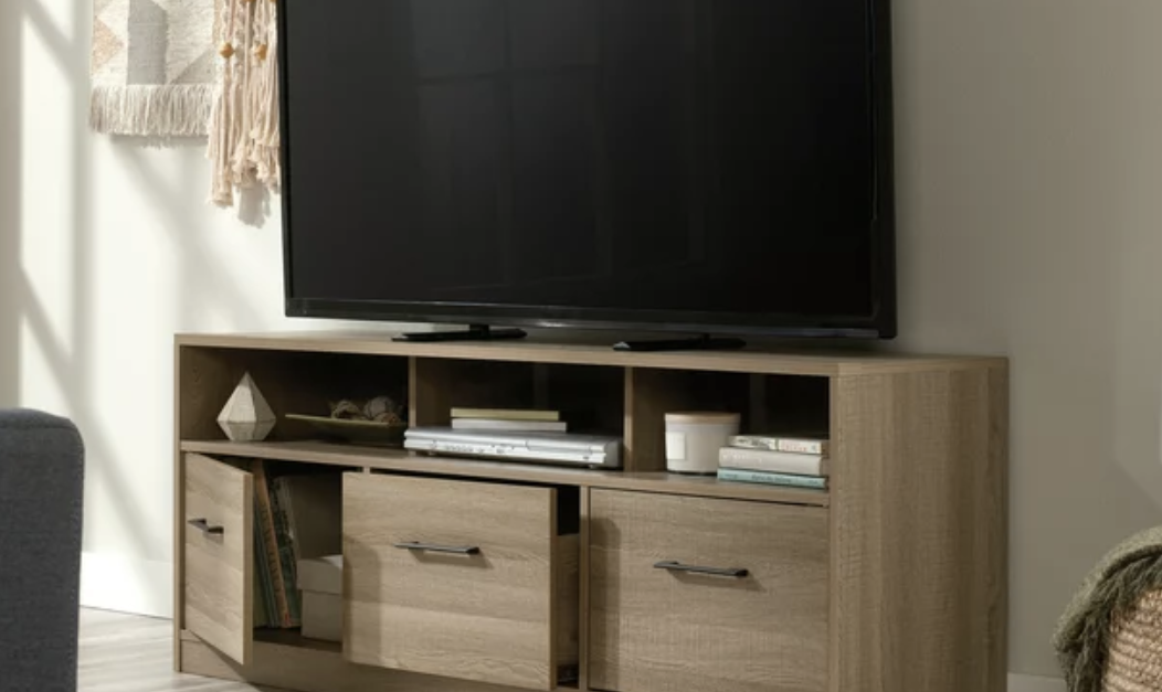 Sauder Beginnings TV stand with large drawer for TVs up to 60″ for $106