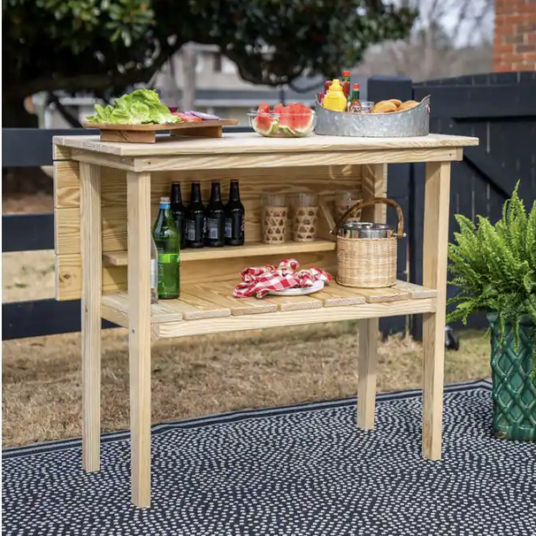 Palmetto Boon solid pine wood outdoor bar table for $85