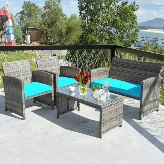 Costway 4-piece patio rattan furniture set with glass table top for $190
